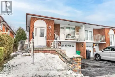 Solidly constructed 5-level backsplit offering approximately 2,960 sq. ft. of total living space, de...