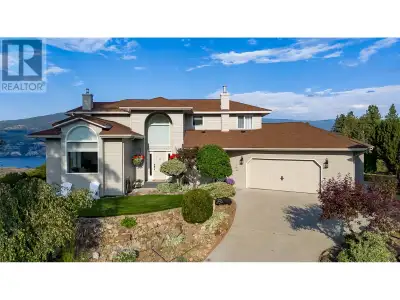 Perched up on a hilltop, this home offers captivating, panoramic views of Lake Okanagan. Surrounded...