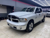 Get ready to own the roads with the stunning 2023 Ram 1500 Classic SLT 4x4 Crew Cab in a pristine wh... (image 2)