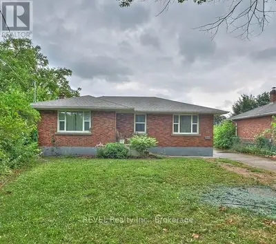 Solid all-brick bungalow with income potential! This well-maintained home features 3 comfortable bed...