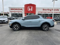 This 2024 Hyundai Santa Cruz Trend boasts a powerful turbocharged engine and stylish Blue Stone exte... (image 9)