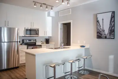 Harbour Landing offers 1 and 2 bedroom suites with stainless steel appliances, granite kitchen count...