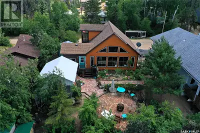 Escape to the Resort Village of Tobin Lake with this well-maintained 2008-built four-season home. En...