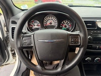 A comfortable midsize sedan with smooth performance, practical features, and a roomy interior, offer... (image 9)