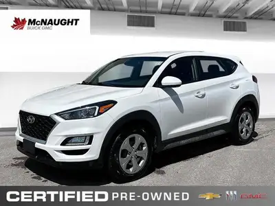 The 2020 Hyundai Tucson in Crystal White features all-wheel drive with advanced safety like lane dep...
