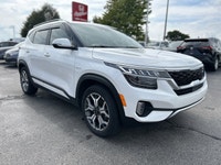 Turn heads and conquer the road in this stunning 2023 Kia Seltos EX AWD, boasting a sleek Snow White... (image 3)
