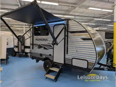 Forest River Aurora Light travel trailer 13BHX highlights: 54in.in. x 74in.in. Queen Bed Two Burner...
