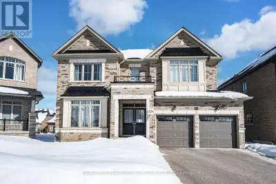 ELEGANT FAMILY HOME SHOWCASING A DESIGNER KITCHEN, A SPA-LIKE PRIMARY SUITE, PREMIUM UPGRADES, & OVE...