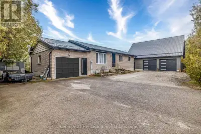 Built for the buyer who needs more than just a house. This 3-bedroom, 2-bath brick bungalow comes wi...