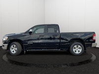 The 2022 Ram 1500 Big Horn isn't just a truck; it's your trusty steed for both work and play, wrappe... (image 1)