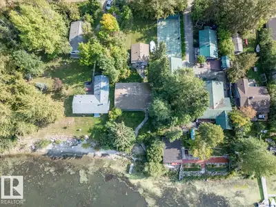 Lakefront Cottage and Guest House on Itaska Beach! The Main Cabin closet to the Lake measures 982 sq...