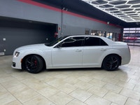 The 2023 Chrysler 300, particularly the 300C RWD in pristine white, is a powerful sedan that truly s... (image 8)