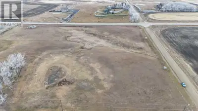 This piece of land is ideally located just outside of Calgary and comes with the sought after zoning...