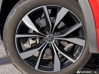 Experience sophisticated style and robust performance with this striking red 2024 Volkswagen Atlas E... (image 5)