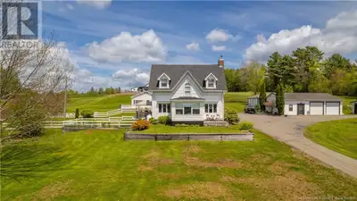 Set on 3.7 acres of gently rolling land, this beautifully renovated farmhouse blends timeless charm...