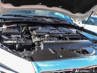 2023 Infiniti QX80 AWD LUXE One Owner, No Accidents. AWD, Pearl White over a Black Leather Interior.... (image 9)