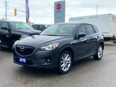 This 2015 Mazda CX-5 GT AWD is a sporty crossover that's smoother than a twisty backroad and comfier...