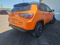 For a quick response please text 403-820-9940. AMVIC licensed business The 2026 Jeep Compass Trailha... (image 4)