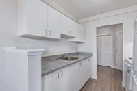 Amenities: Air Conditioning • Heat & Water Included • Balconies Suite & Building: Spacious bachelor,... (image 4)