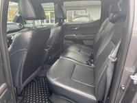 The 2023 Toyota Tacoma TRD Sport V6 in stunning gray is ready to tackle any terrain with its robust... (image 9)