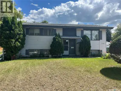 Great Location!! Bi Level on a large pie shaped lot with beautiful backyard. Nice kitchen & dining r...