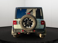 This Jeep Wrangler has a dependable Regular Unleaded V-6 3.6 L/220 engine powering this Automatic tr... (image 4)