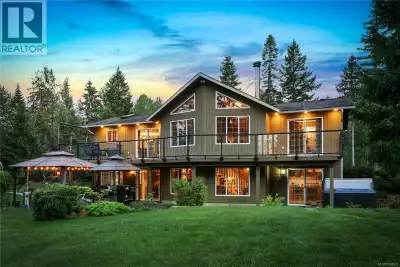 Tucked away on nearly 12 acres of private land just outside Courtenay in the coveted Dove Creek area...