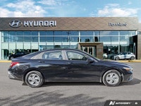 This 2024 Hyundai Elantra Essential shines with its sleek Abyss Black exterior and practical feature... (image 5)
