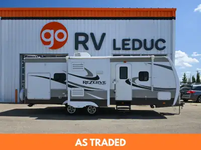 Comfortable and well-designed 2015 Rezerve 26RL travel trailer, perfect for couples or small familie...