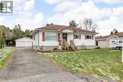 Charming 3-Bedroom Bungalow with Heated 2-Car Garage - Quiet North End Location. Welcome to this wel...