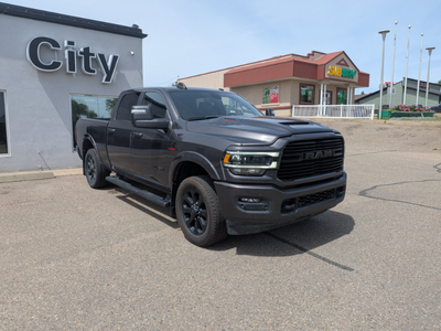 Meet the 2024 RAM 2500 Laramie at City Chrysler — a heavy-duty workhorse dressed in premium style. U...