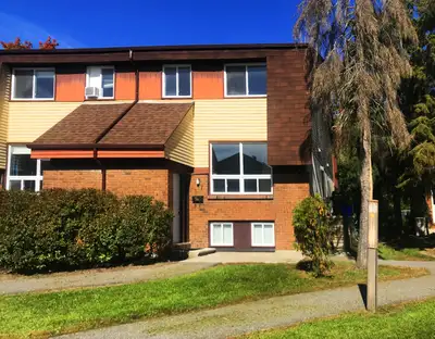 Welcome to 137 Renova Private - Renovated 2+1 bedroom row unit in great location. Main floor has ope...