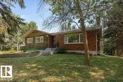 Antler Lake Woodland Retreat... Immaculately maintained Bungalow 1157 sq. ft. nestled on a treed dou...