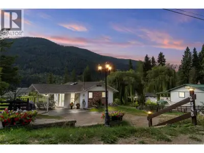 Welcome to your own private oasis on the shores of Paul Lake, featuring a secluded bay and stunning...