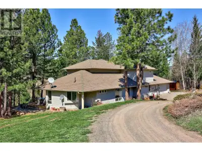 Welcome to Your Private Equestrian Paradise above the Coldwater River! With 9.83 picturesque acres,...
