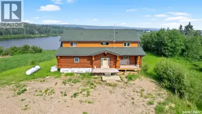 Experience the tremendous potential in this lakefront paradise log home an hour’s drive north of Sas...