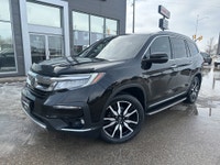 New Arrival! Drive home comfort, space, and reliability in this 2019 Honda Pilot Touring 8 Passenger... (image 1)
