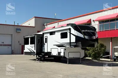 This 2022 K-Z Durano 333RLT is a luxurious pre-owned fifth wheel that has been upgraded to the max a...