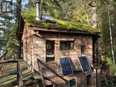 Incredible secluded waterfront property near Twin Islands- Indian Arm! This is the sweetest little s...