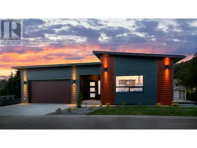 Welcome to this stunning ground level entry home, where modern elegance meets comfort and functional...