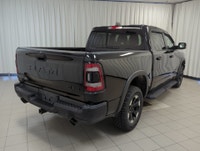 Remarkably capable, our 2022 RAM 1500 Rebel Crew Cab 4X4 is a terrific trail truck with a rugged Dia... (image 7)