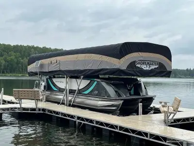 Features: 6010 Lift Capacity Integrated Power Unit Solar Panel Kit 12V Battery Tray 11' Vinyl Bunks...