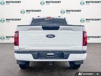 The 2024 Ford F-150 STX in a striking white finish is the perfect blend of power and practicality. I... (image 4)