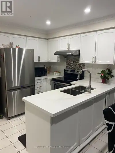 Bright And Spacious 3+1 Bedroom Freehold Townhome(Rear Quad) Located In Very Desirable Springdale Lo...