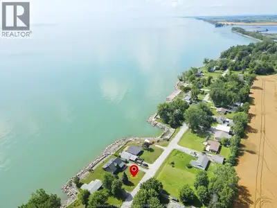 WATERFRONT LAKE ERIE! Escape to or Live at your very own Cozy, Quiet and Spacious 4 Bdrm Log Cabin o...