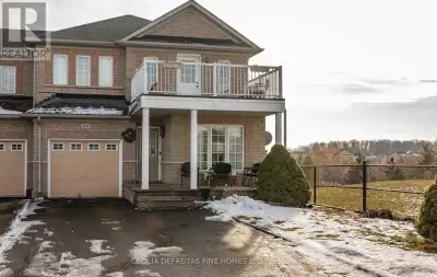 Warm & Cozy 1 bdrm + den basement apartment In An End Unit Townhouse, Located Right Beside A Family-...