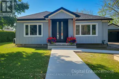 Welcome to 355 Ridge Rd W, Grimsby, a beautifully fully updated bungalow nestled on the scenic Niaga...