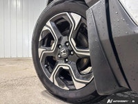 The 2018 Honda CR-V Touring AWD delivers premium comfort, advanced safety, and confident all-weather... (image 9)