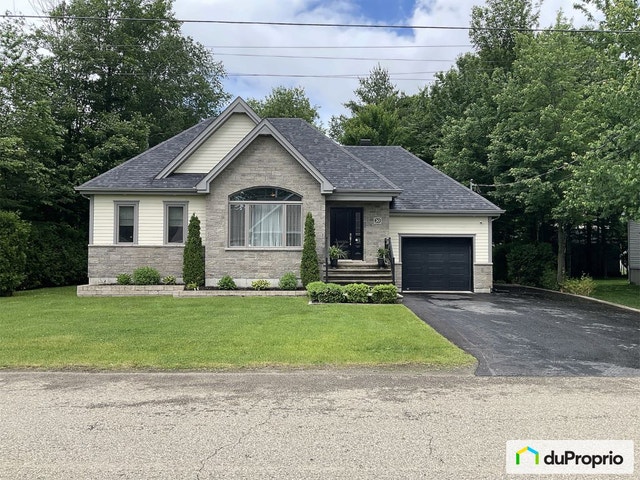 $749,900 - Bungalow for sale in Ste-Mélanie — photo 1