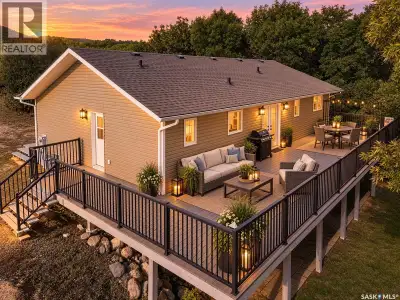 Welcome to lake living at Buffalo Pound Lake! Built in 2015, this spacious walkout bungalow offers o...